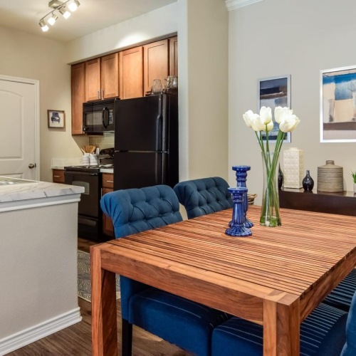 a kitchen with a dining table