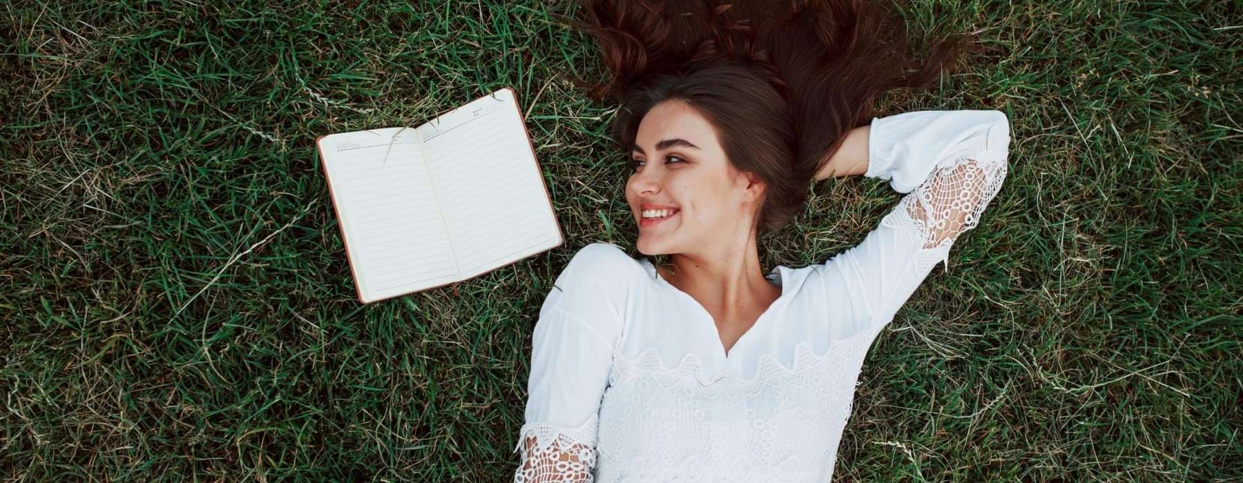 a person lying in the grass