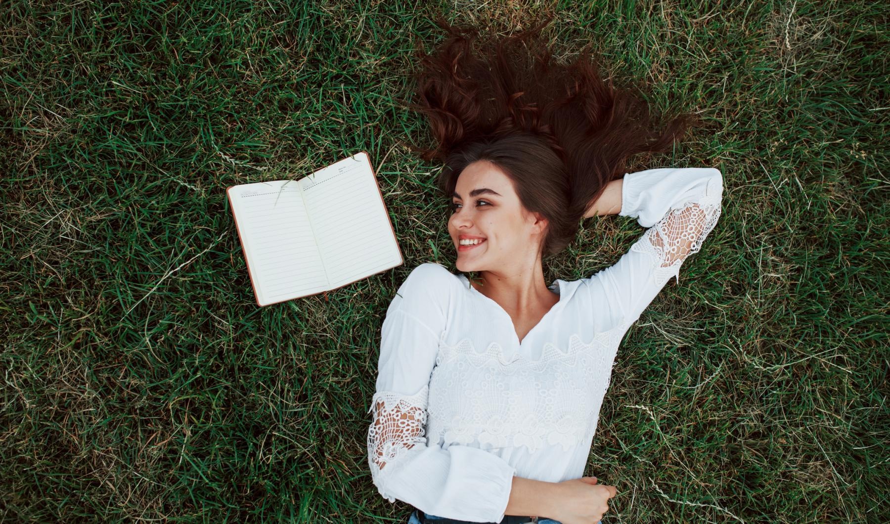 a person lying in the grass