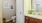 a bathroom with a sink toilet and mirror