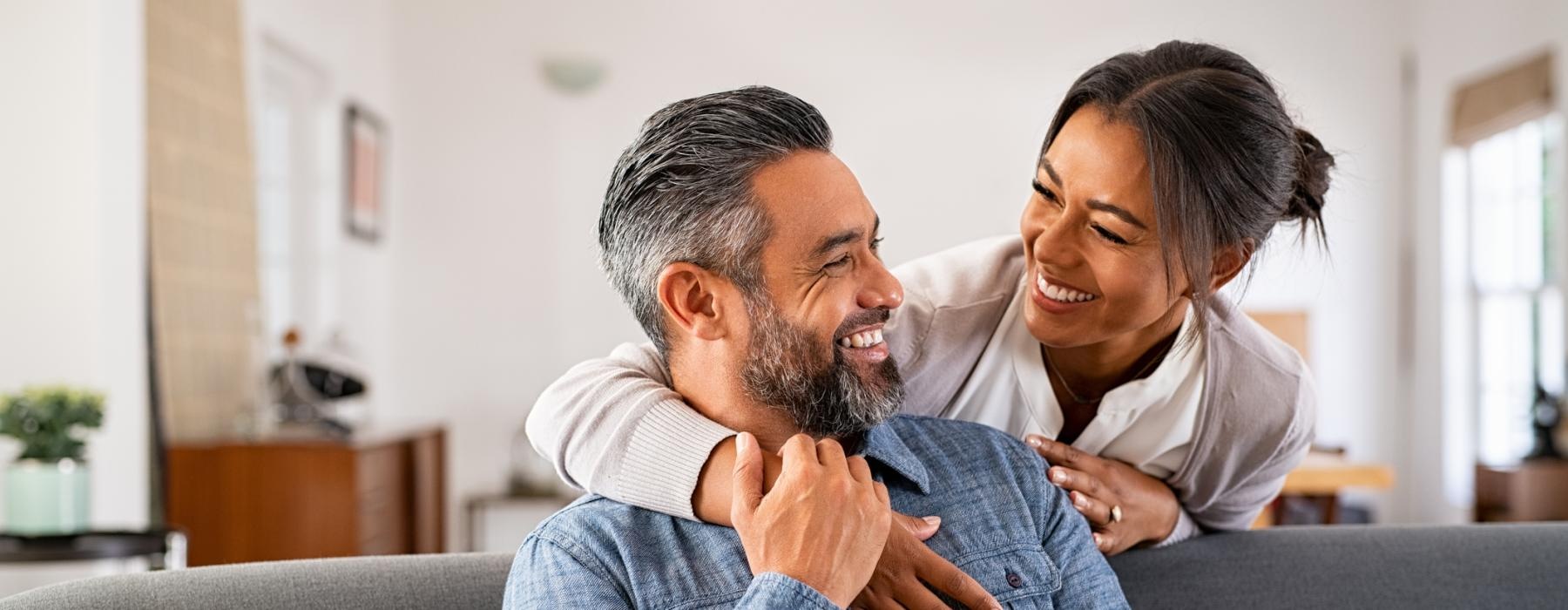 a man and a woman sitting on a couch