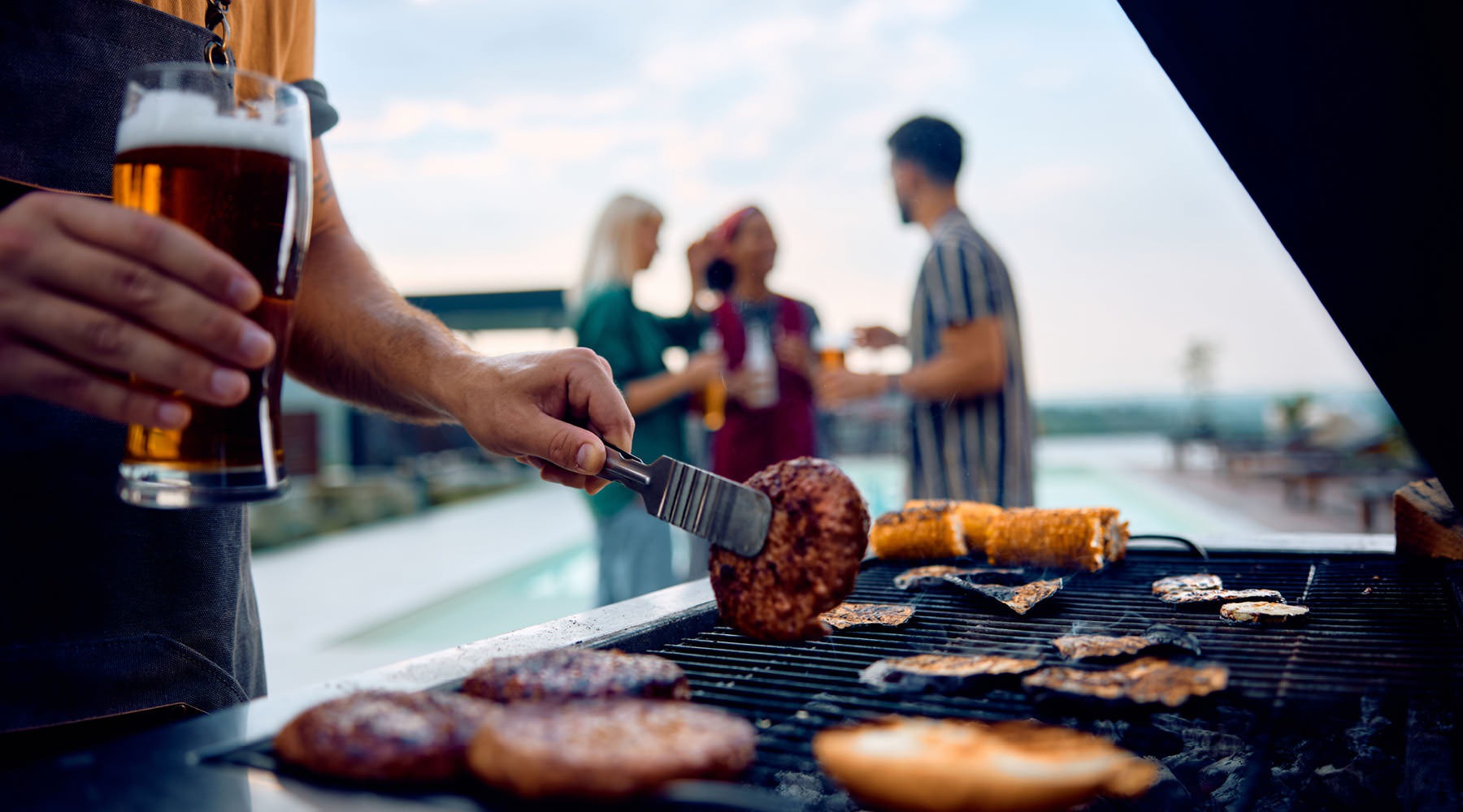 a person cooking food on a grill
