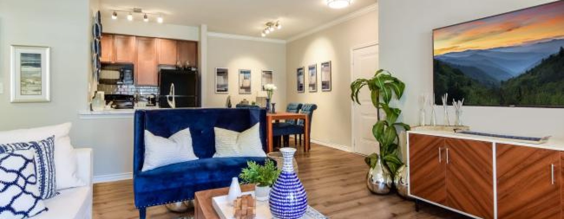 a living room with a couch and a table
