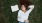 a person lying in the grass